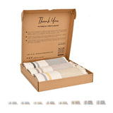 Geöffnete Geschenkbox mit Palma-Foutas des Ksour Sets