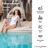 Frau sitzt am Pool mit einer grau gestreiften Palma-Fouta