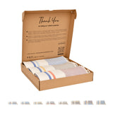 Geöffnete Geschenkbox mit Palma-Foutas des Medina Sets