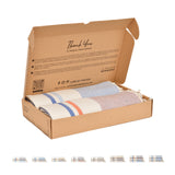 Geöffnete Geschenkbox mit Palma-Foutas des Numidia Sets